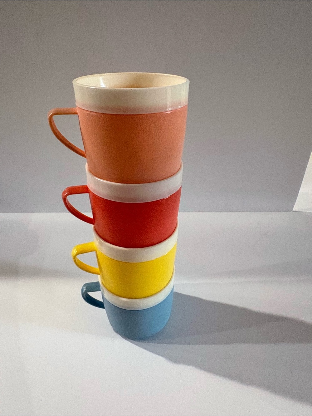 Vintage MCM Bolero Therm-O-Ware Stackable Mugs Set in Coral, Red, Yellow & Blue